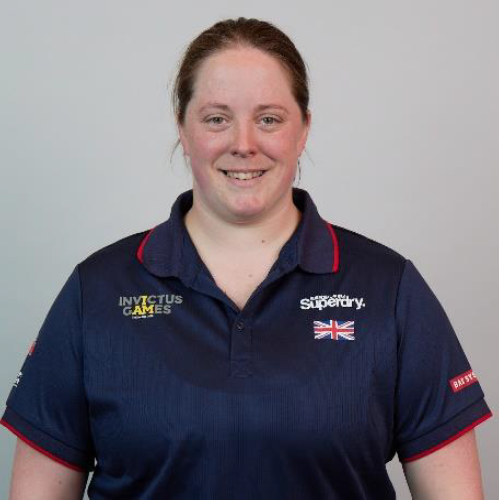 Personnel wears Invictus Games uniform in portrait.